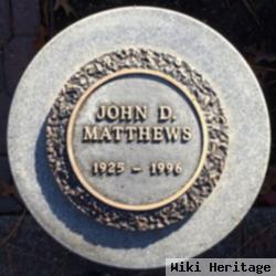 John D Matthews