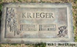 Alexander J Krieger