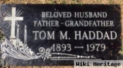 Tom M Haddad