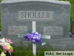 Frank L Sholler