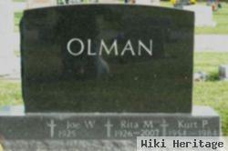 Kurt P Olman