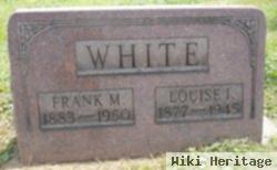 Frank M White