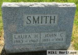 Laura H Cox Smith