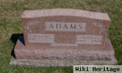 Floyd E Adams