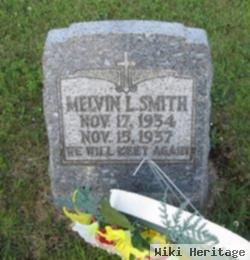 Melvin L Smith