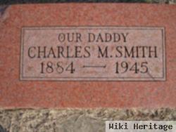 Charles M Smith