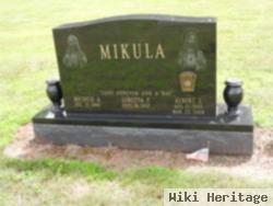 Albert J Mikula