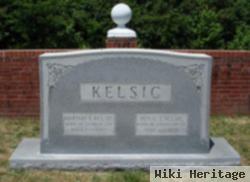 Martha E. Kelsic