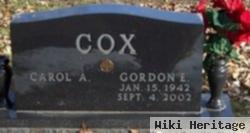 Gordon E Cox