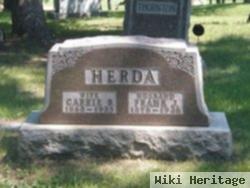 Frank J. Herda