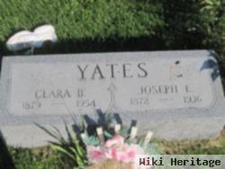 Joseph E Yates