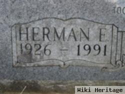 Herman E. Ash