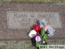 John M. Omodt