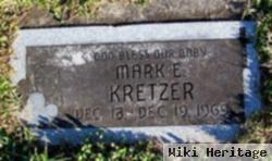 Mark E. Kretzer