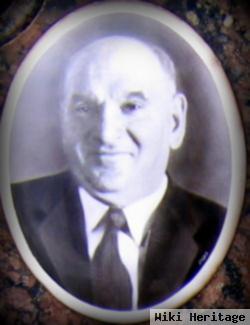 John M Harcharik