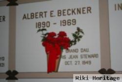 Albert E Beckner