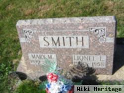 Lionel E Smith