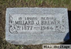 Millard J Brewer