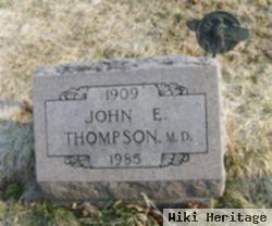 Dr John E Thompson