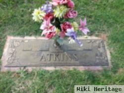 C. Austin Atkins