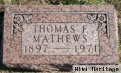 Thomas F Mathews