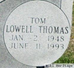 Lowell Thomas "tom" Holmes