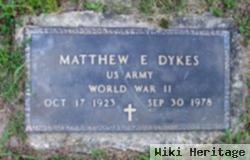 Matthew E Dykes