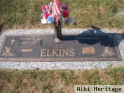 Thomas M Elkins