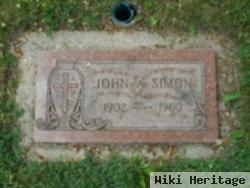 John A Simon