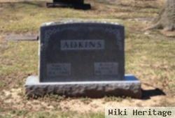 Laura E Adkins