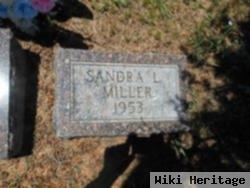 Sandra L Miller