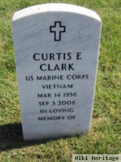 Curtis E Clark