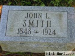 John L Smith