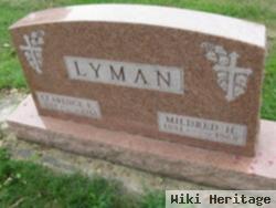 Clarence E Lyman