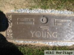 Clarence M Young