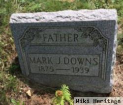 Mark J. Downs