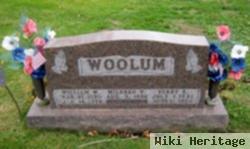 Terry E Woolum