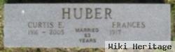 Curtis E Huber