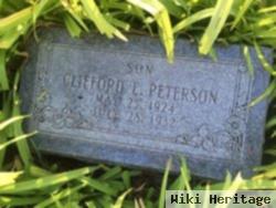 Clifford E Peterson