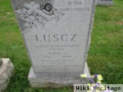 John J Luscz