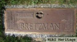 Raymond E Bretzman