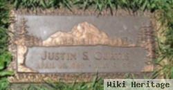 Justin S Curtis