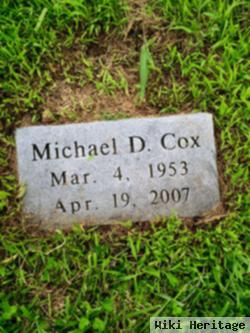 Michael D Cox