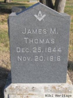 James M. Thomas