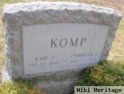 Christian D Komp