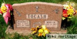 Joseph G Tocash