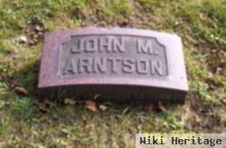 John M Arntson