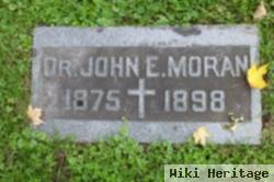 Dr John E Moran