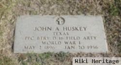 John A. Huskey