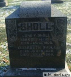 John F Sholl